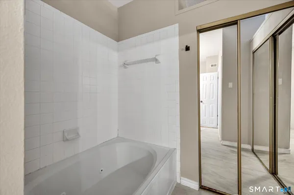 a bathroom with a bathtub