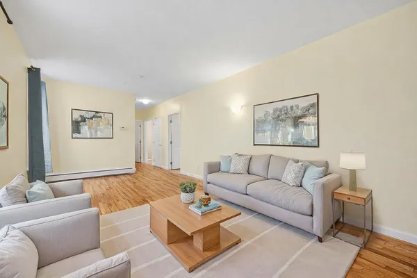 a living room with furniture and a couch