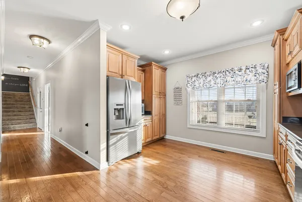 a view of livingroom with furniture wooden floor and window