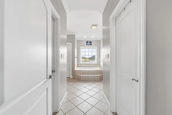 a bathroom with a bathtub and shower
