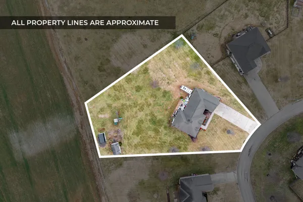 an aerial view of a house with a fireplace