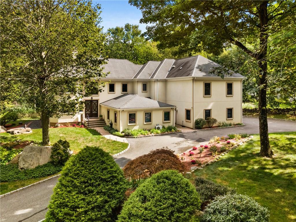 Exceptional grandeur awaits in this four-bedroom, six-bathroom custom renovated home situated on around 1.88 acres in Somers.
