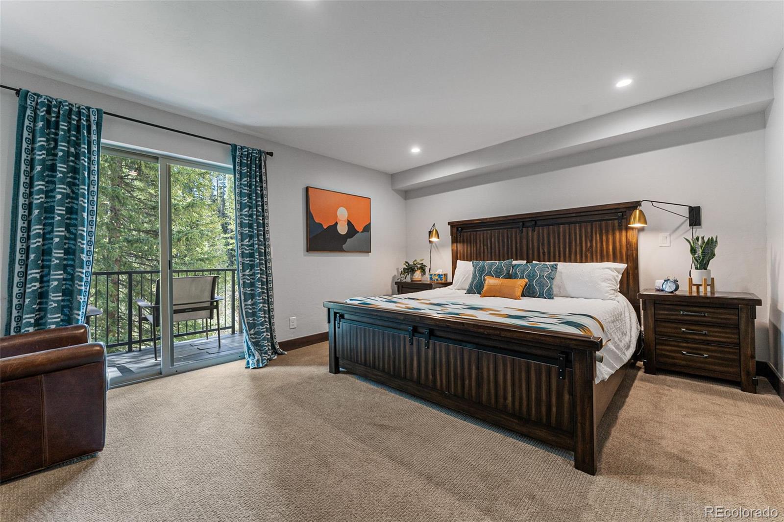 500 Vasquez Road, Unit 7A Winter Park, CO 80482 - Photo 22 of 49 a bed room with a bed and a television