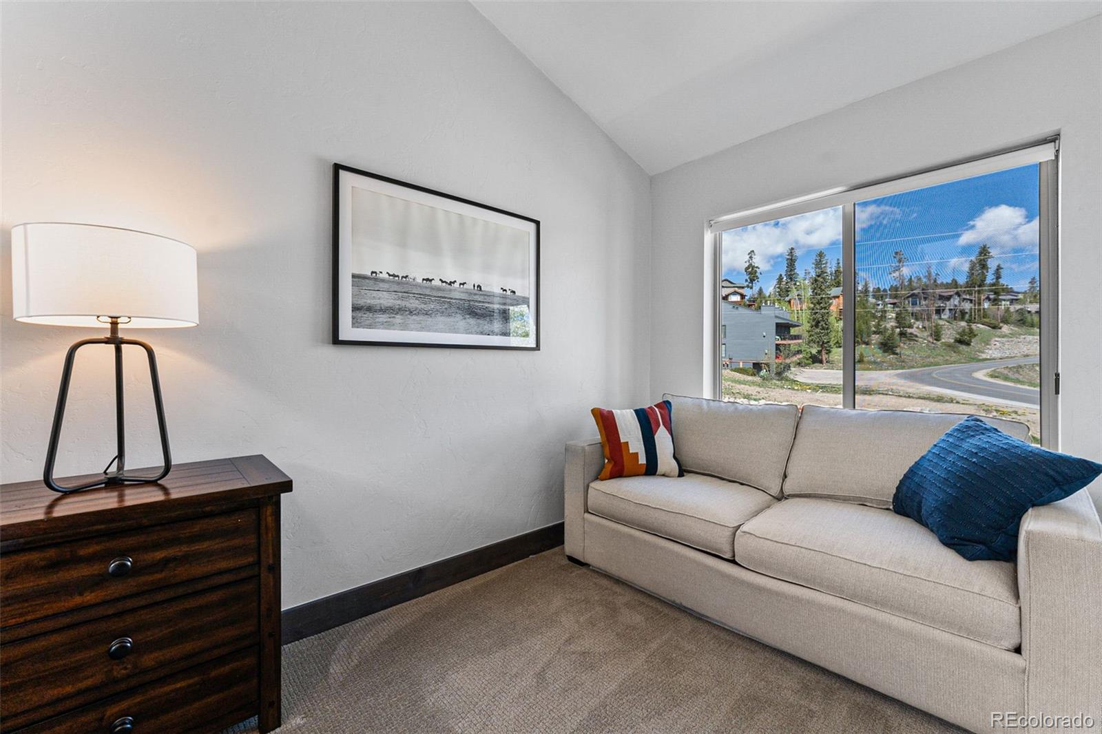 500 Vasquez Road, Unit 7A Winter Park, CO 80482 - Photo 31 of 49 a living room with furniture and a window