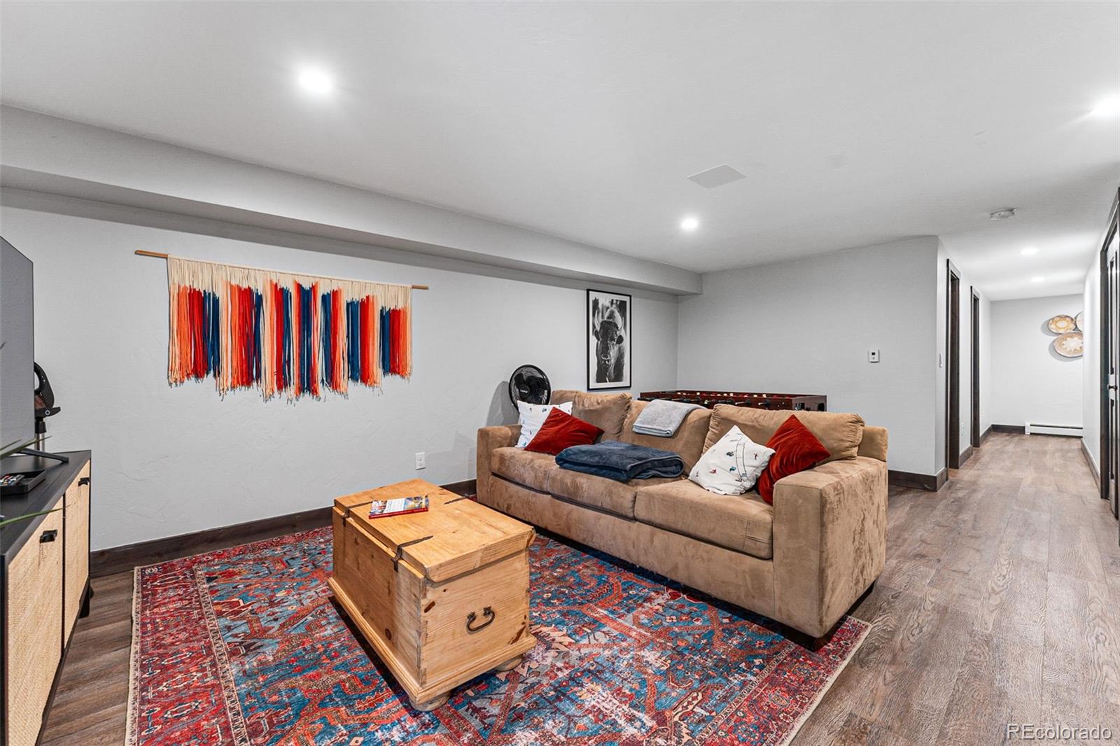 500 Vasquez Road, Unit 7A Winter Park, CO 80482 - Photo 41 of 49 a living room with furniture and a couch