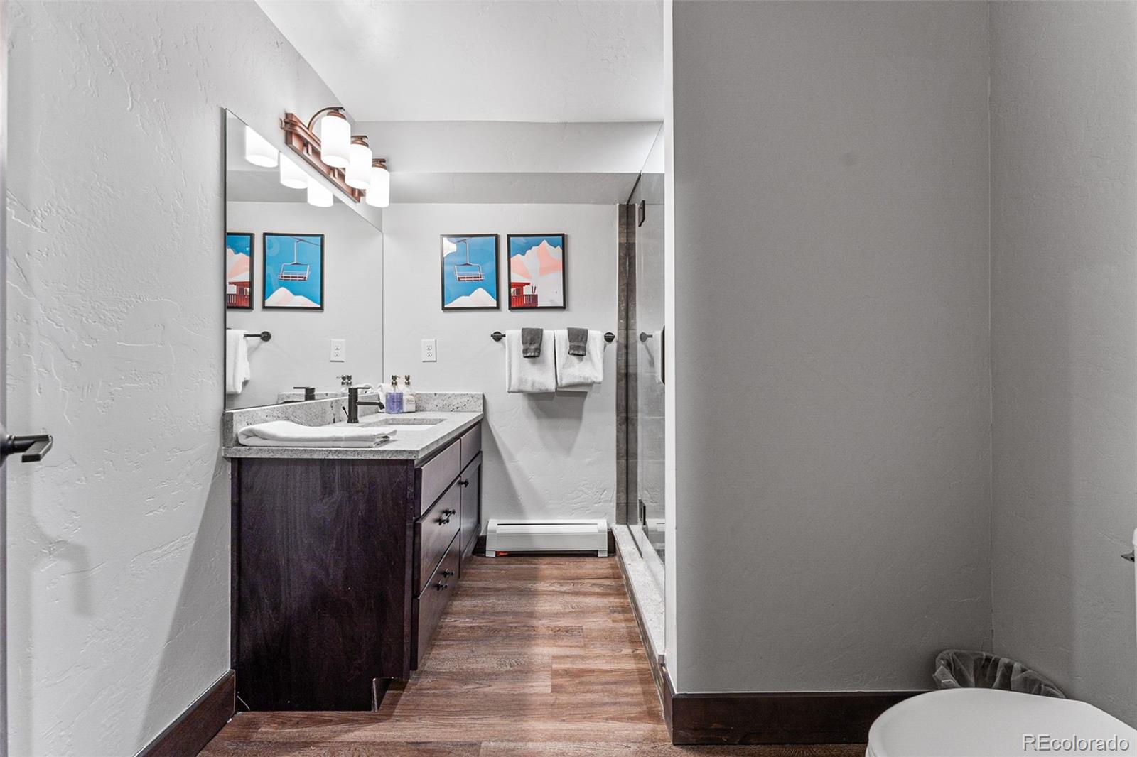 500 Vasquez Road, Unit 7A Winter Park, CO 80482 - Photo 42 of 49 a bathroom with a sink and a mirror