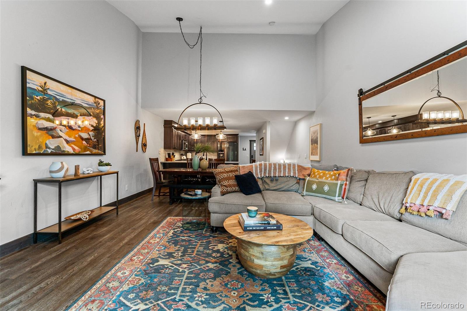 500 Vasquez Road, Unit 7A Winter Park, CO 80482 - Photo 7 of 49 a living room with furniture and a wooden floor