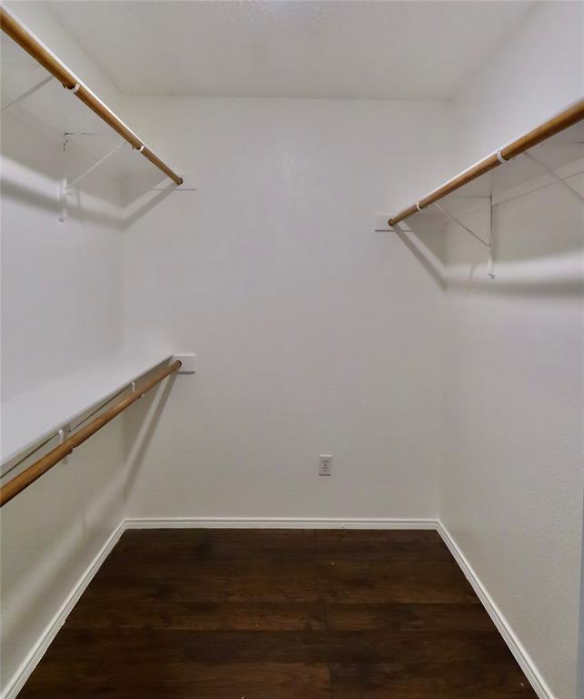 805 Gillon Drive Arlington, TX 76001 - Photo 12 of 12 a view of an empty walk in closet