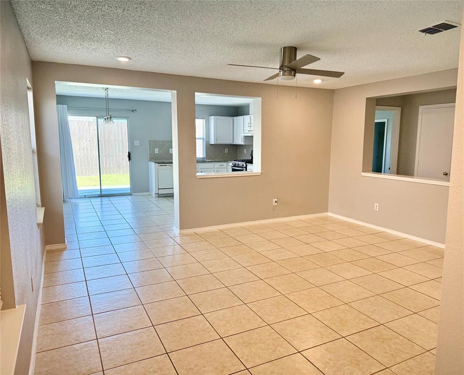 805 Gillon Drive Arlington, TX 76001 - Photo 2 of 12 a view of an empty room and bathroom