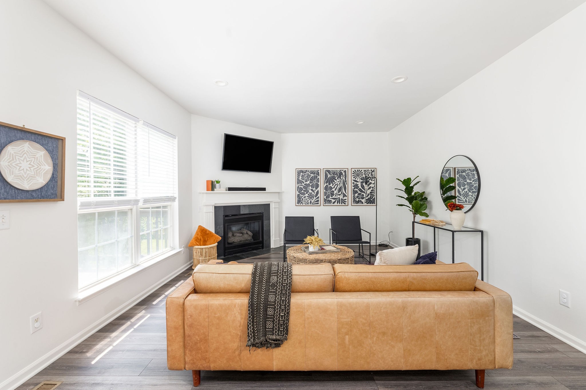 310 Devonshire Drive Franklin, TN 37064 - Photo 15 of 47 a living room with furniture a fireplace and a large window