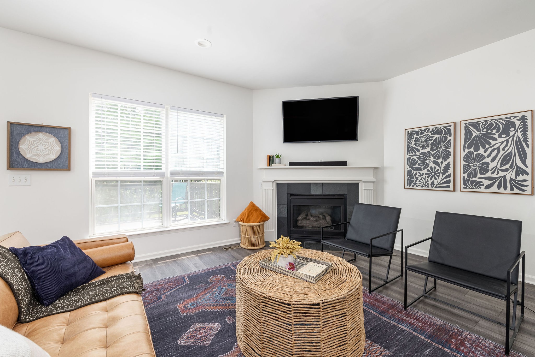 310 Devonshire Drive Franklin, TN 37064 - Photo 18 of 47 a living room with furniture a fireplace and a flat screen tv