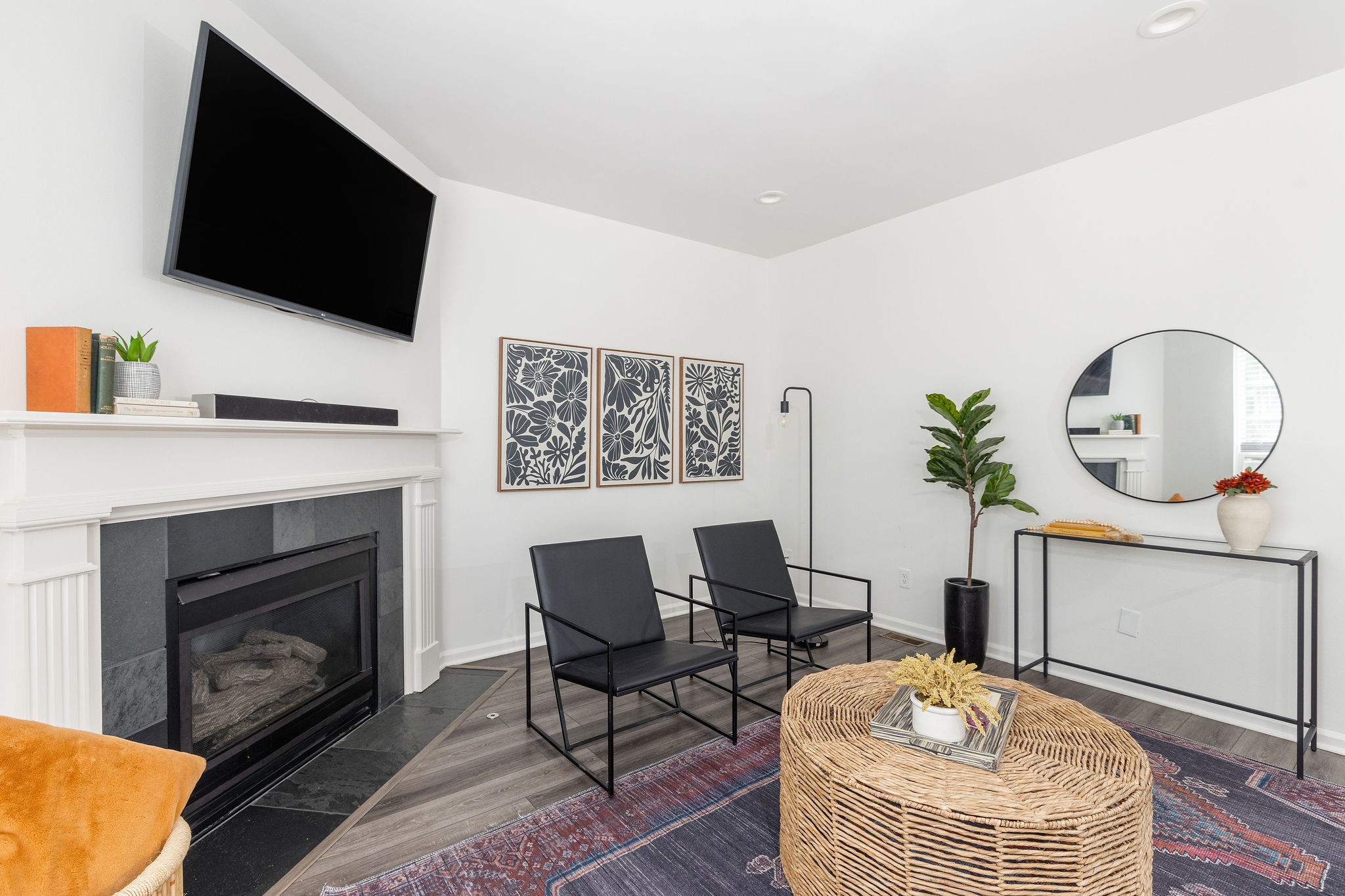 310 Devonshire Drive Franklin, TN 37064 - Photo 19 of 47 a living room with furniture a flat screen tv and a fireplace