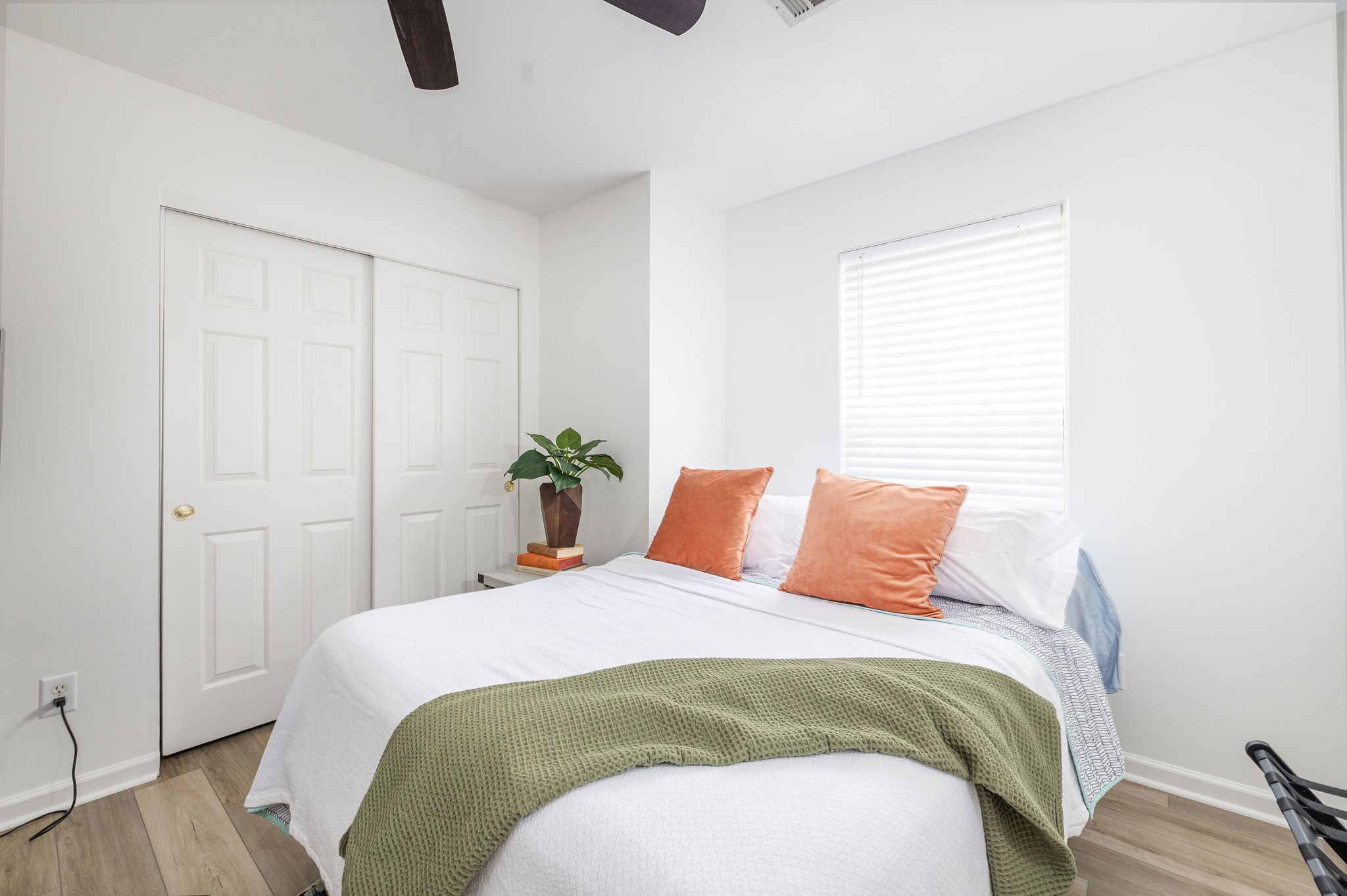 310 Devonshire Drive Franklin, TN 37064 - Photo 34 of 47 a bedroom with a bed and a potted plant