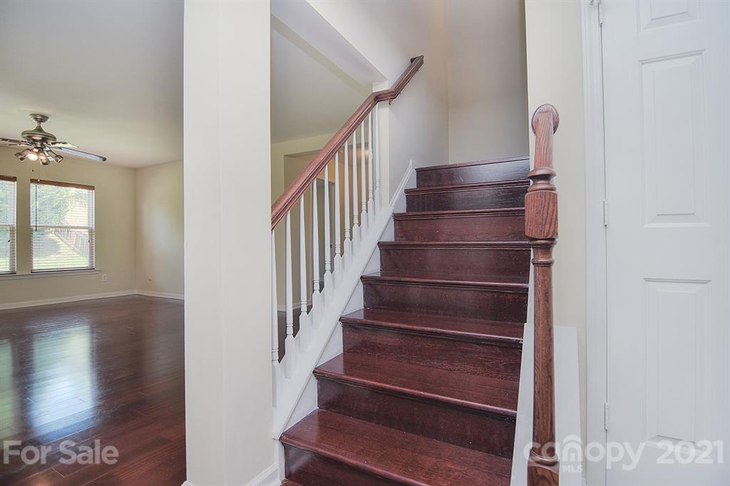 9029 Seamill Road Charlotte, NC 28278 - Photo 19 of 46 a view of entryway and hall with wooden floor