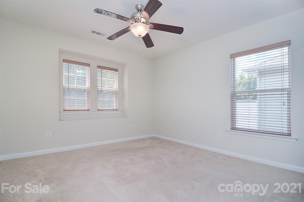 9029 Seamill Road Charlotte, NC 28278 - Photo 27 of 46 a view of an empty room with a window