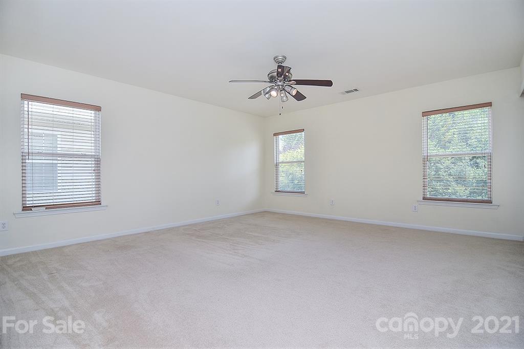 9029 Seamill Road Charlotte, NC 28278 - Photo 28 of 46 a view of an empty room with a window