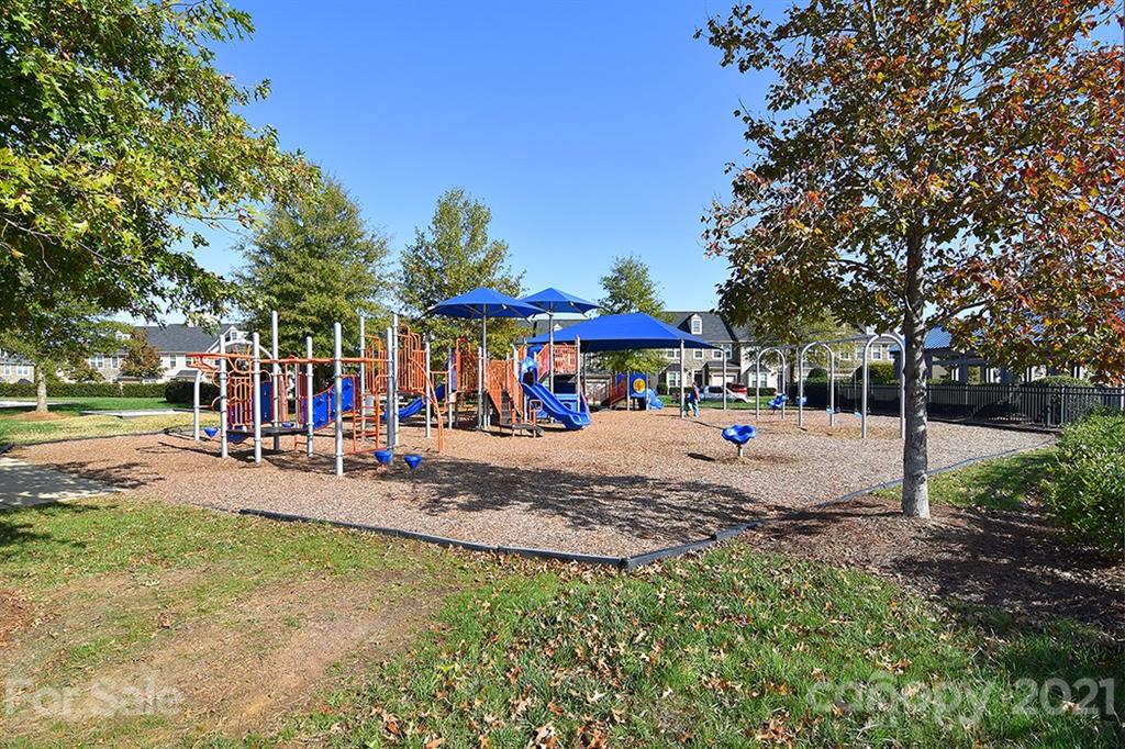 9029 Seamill Road Charlotte, NC 28278 - Photo 36 of 46 a view of street with people and trees