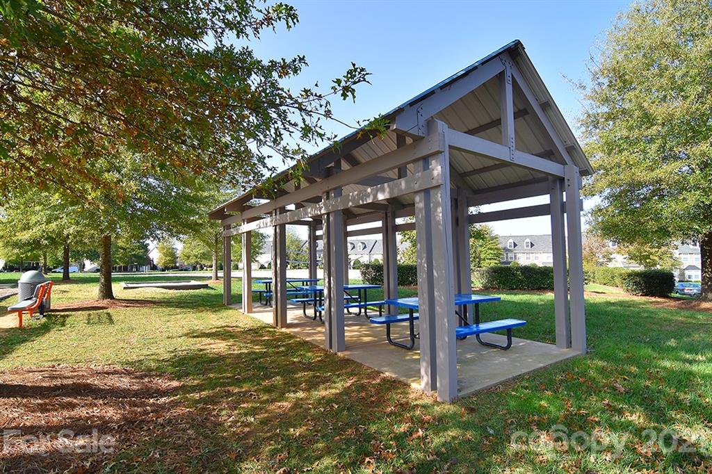 9029 Seamill Road Charlotte, NC 28278 - Photo 37 of 46 a view of a house with a yard and sitting area