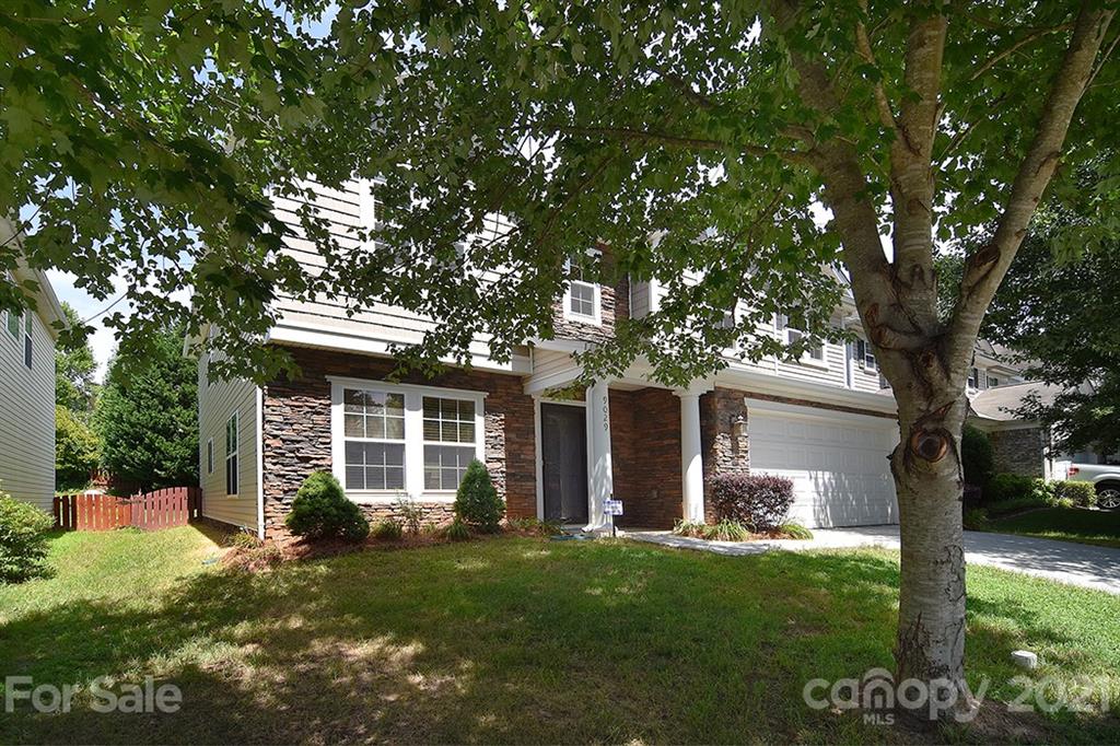 9029 Seamill Road Charlotte, NC 28278 - Photo 46 of 46 a front view of a house with a garden
