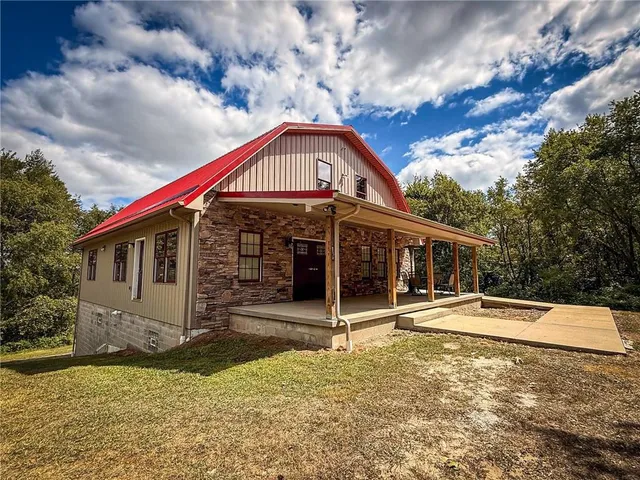 a front view of house with yard