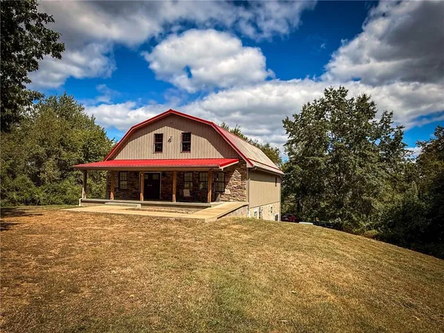 a view of an empty room with a balcony