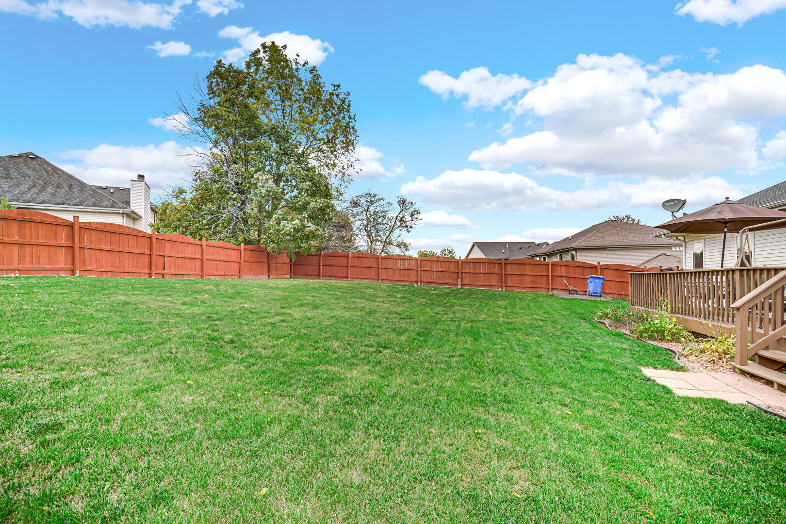 1055 Doe Path Lane Crown Point, IN 46307 - Photo 13 of 26 a view of yard with swimming pool and green space