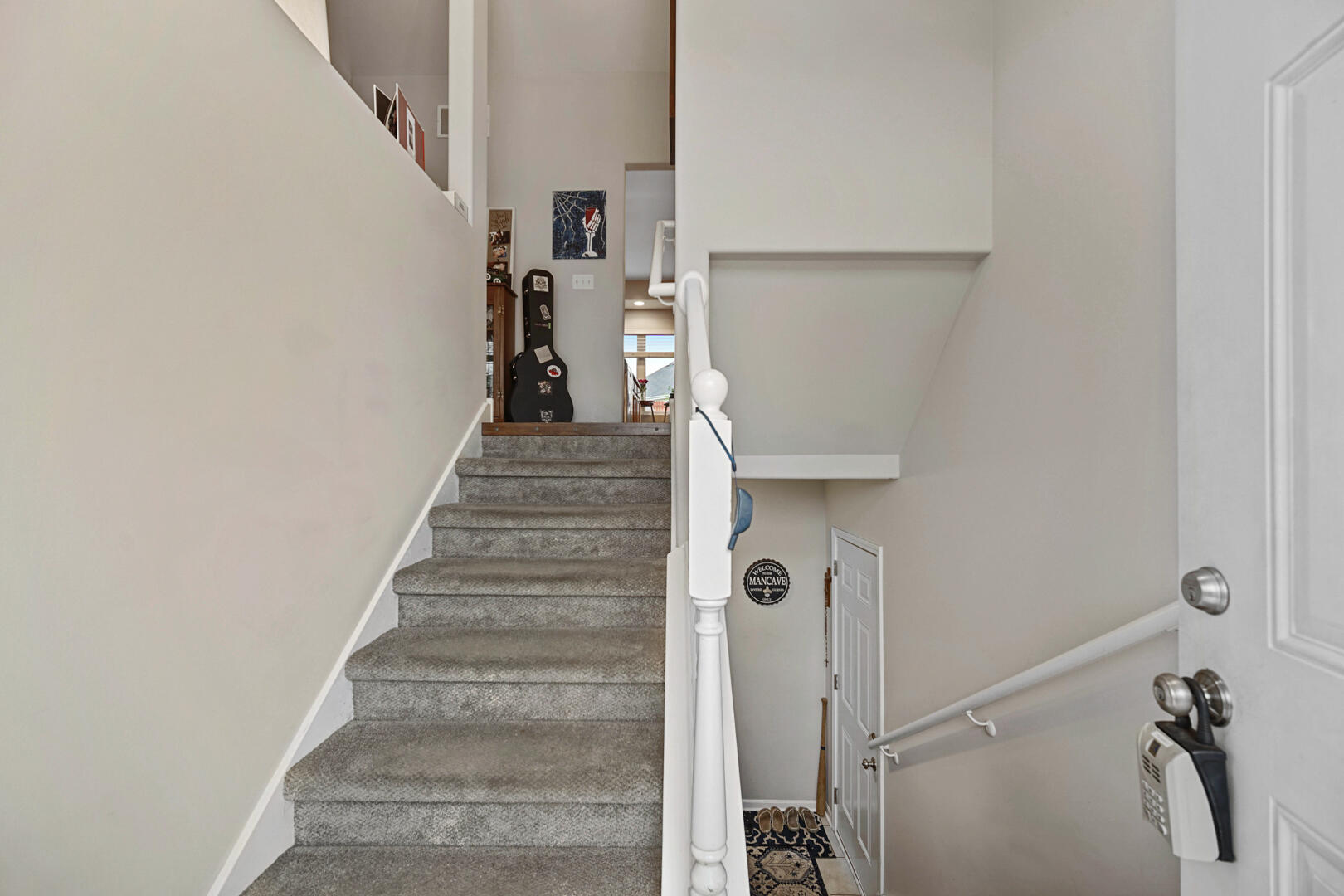 1055 Doe Path Lane Crown Point, IN 46307 - Photo 16 of 26 a view of staircase with white walls