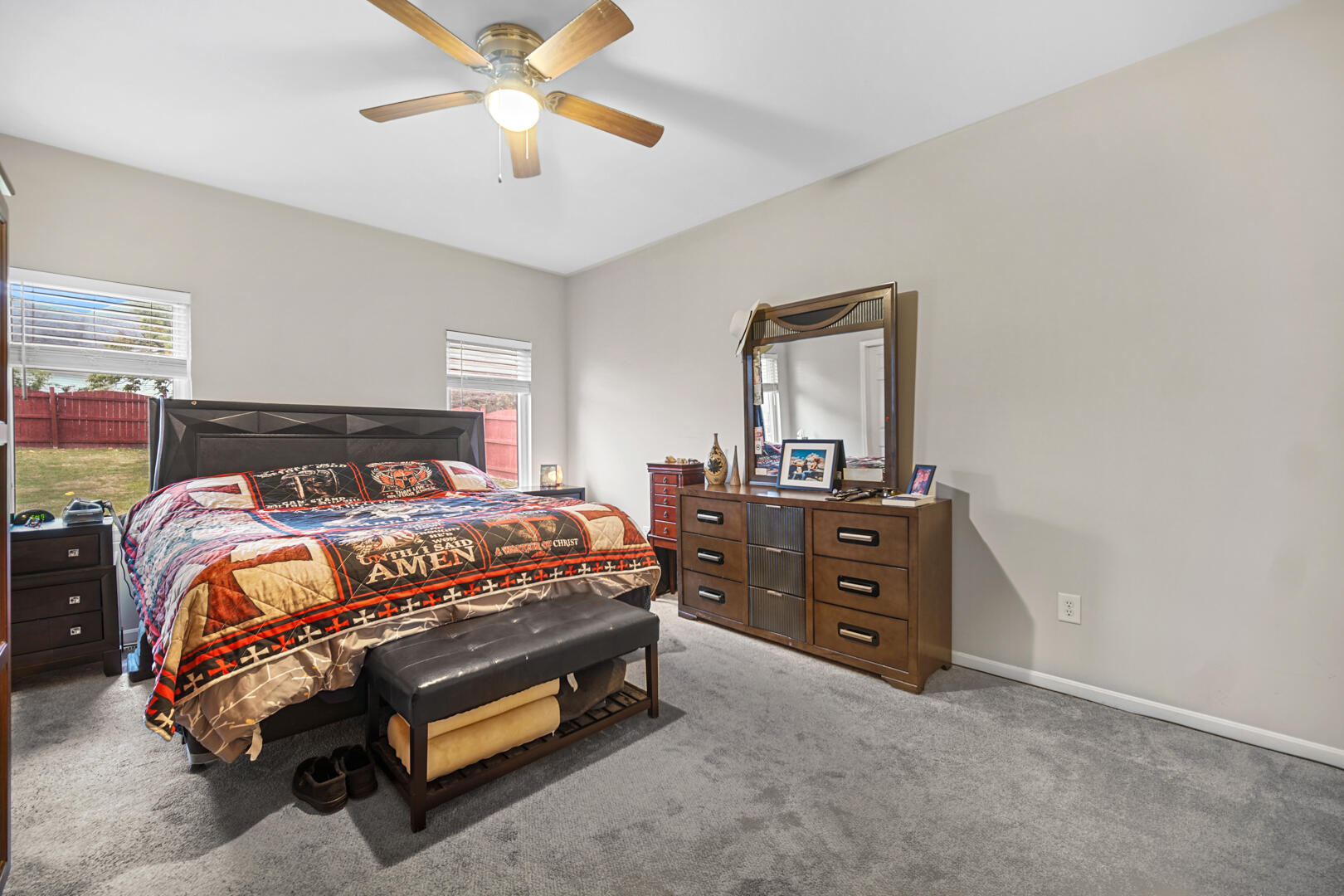1055 Doe Path Lane Crown Point, IN 46307 - Photo 20 of 26 a bedroom with a bed and a dresser in it