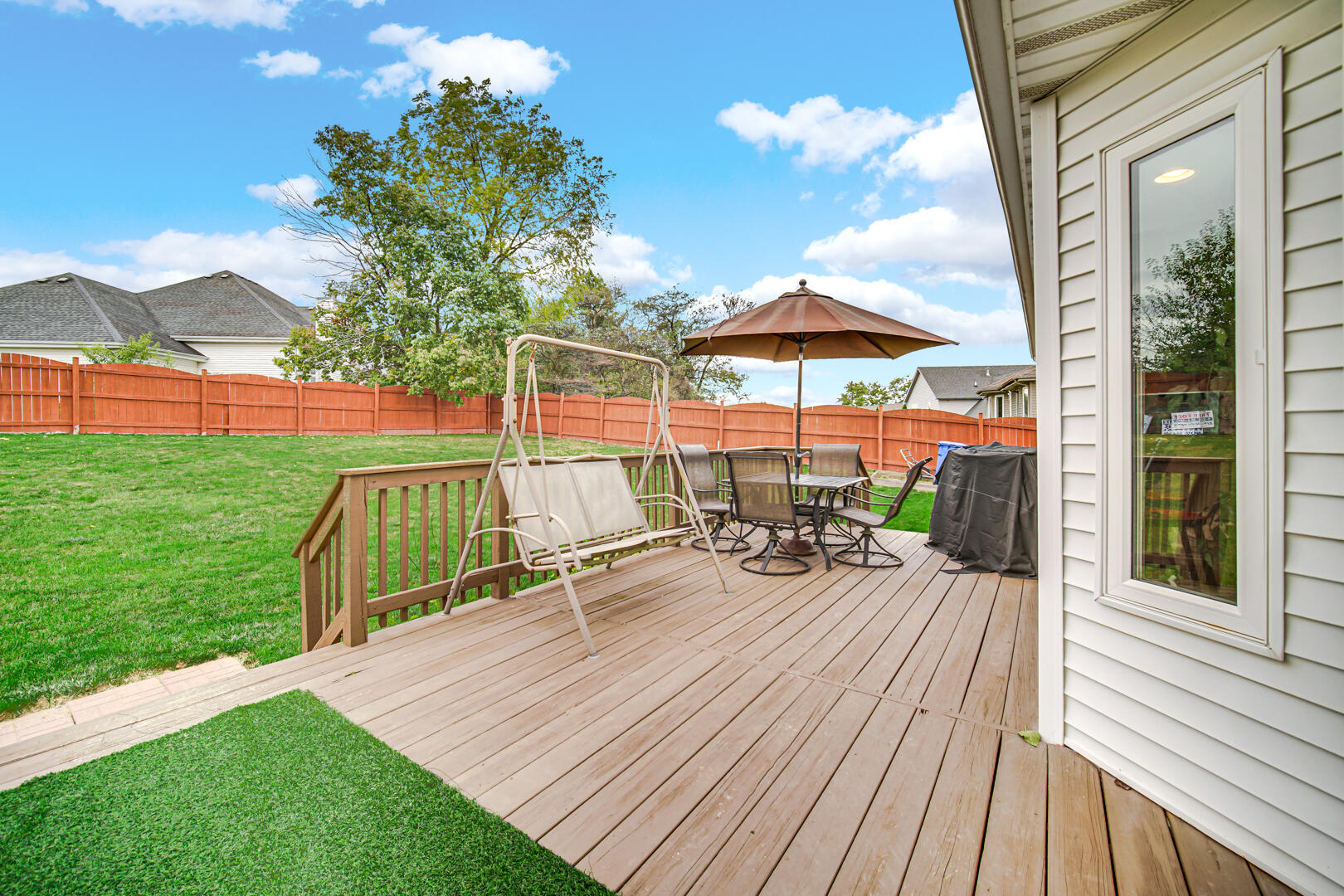 1055 Doe Path Lane Crown Point, IN 46307 - Photo 26 of 26 a view of outdoor space yard deck patio and outdoor kitchen