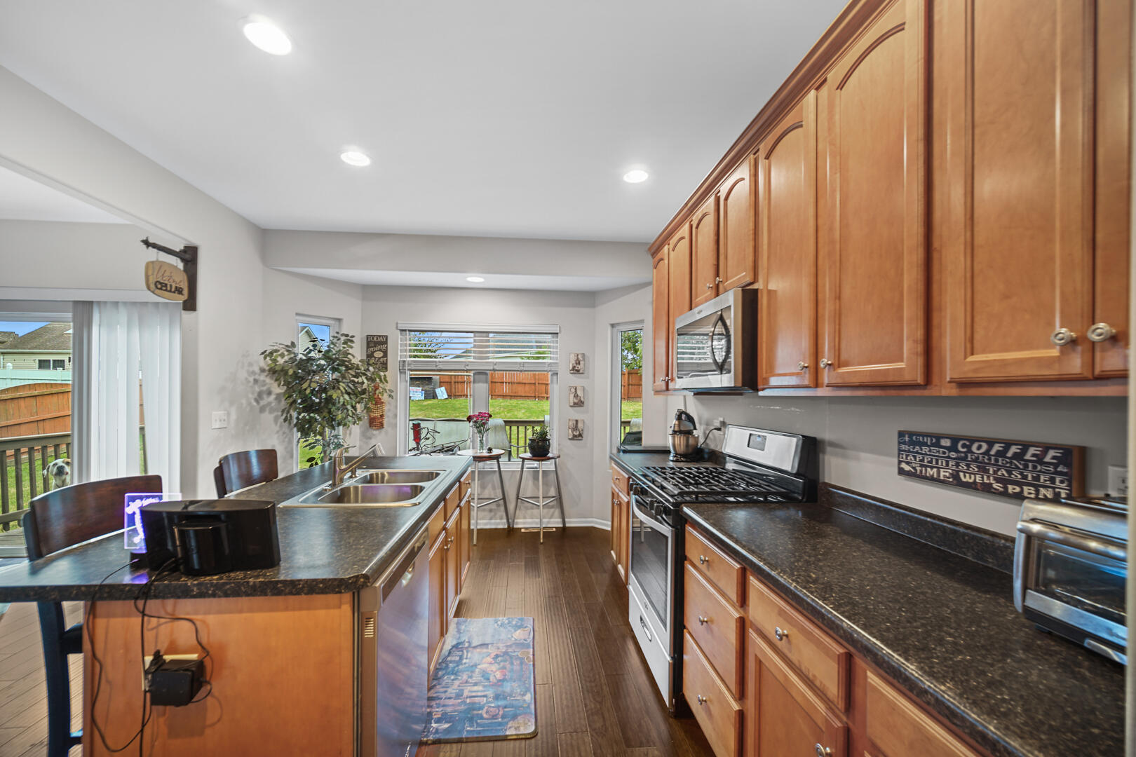 1055 Doe Path Lane Crown Point, IN 46307 - Photo 5 of 26 a kitchen with lots of counter top space and stainless steel appliances