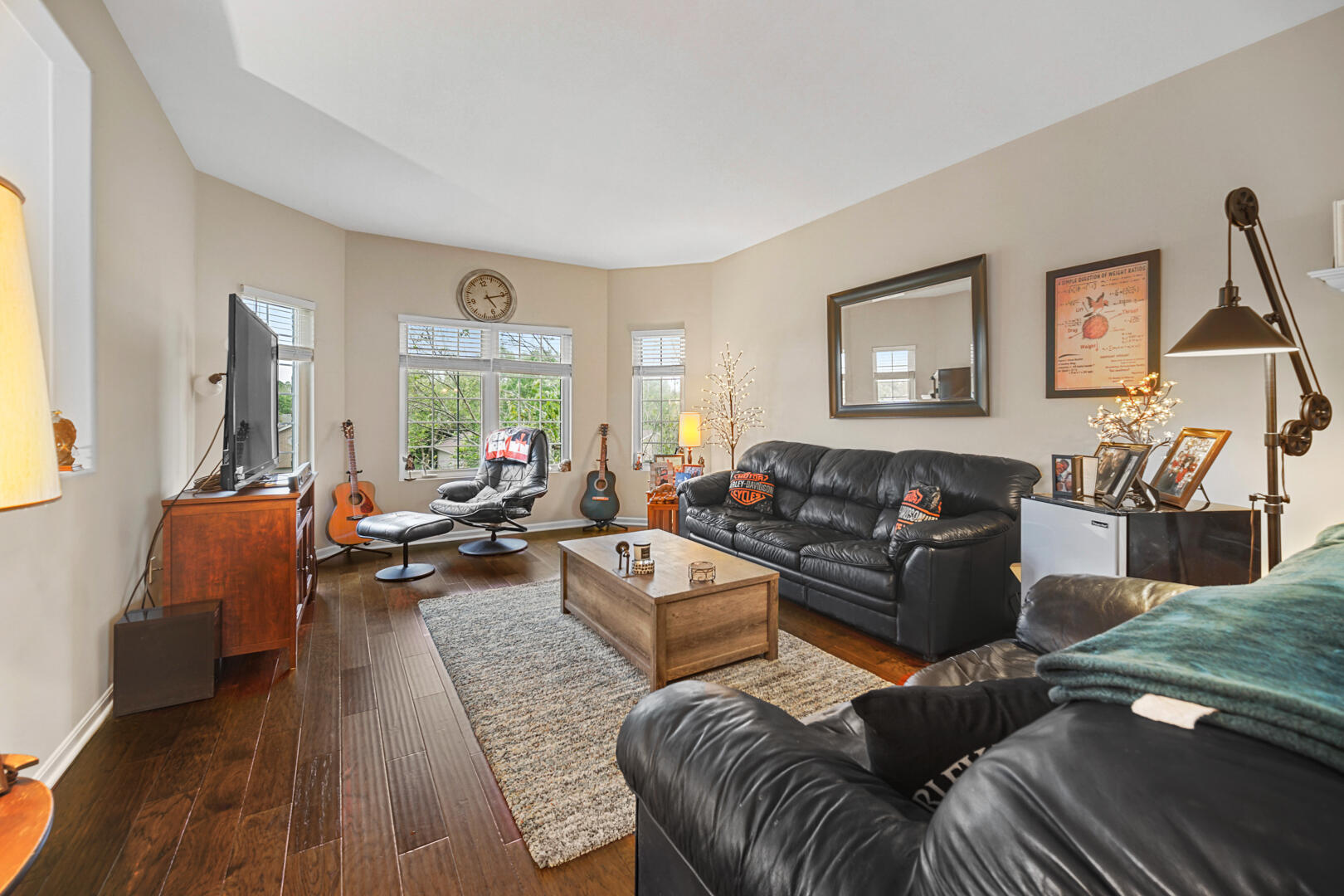 1055 Doe Path Lane Crown Point, IN 46307 - Photo 8 of 26 a living room with furniture and a wooden floor