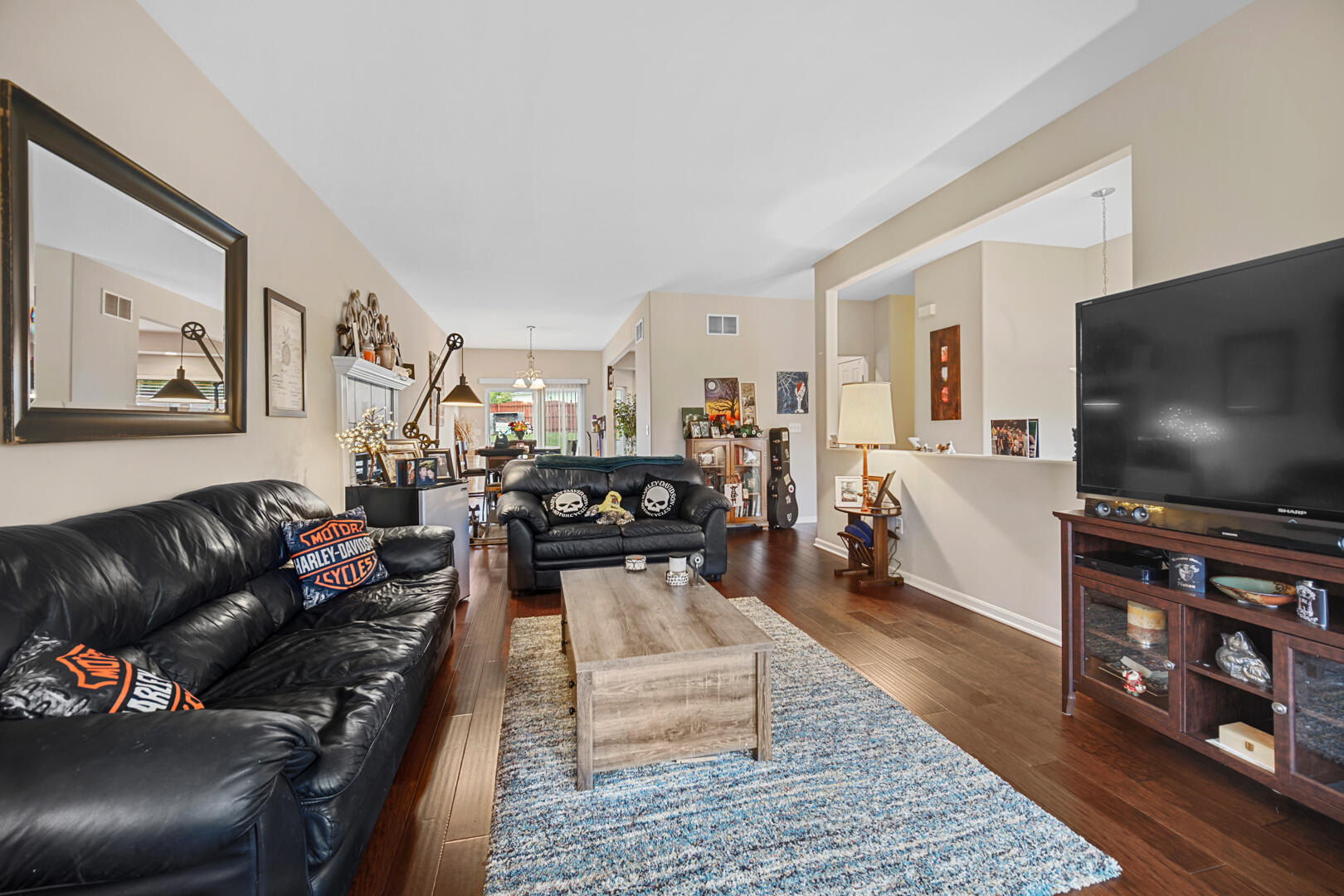 1055 Doe Path Lane Crown Point, IN 46307 - Photo 9 of 26 a living room with furniture and a flat screen tv