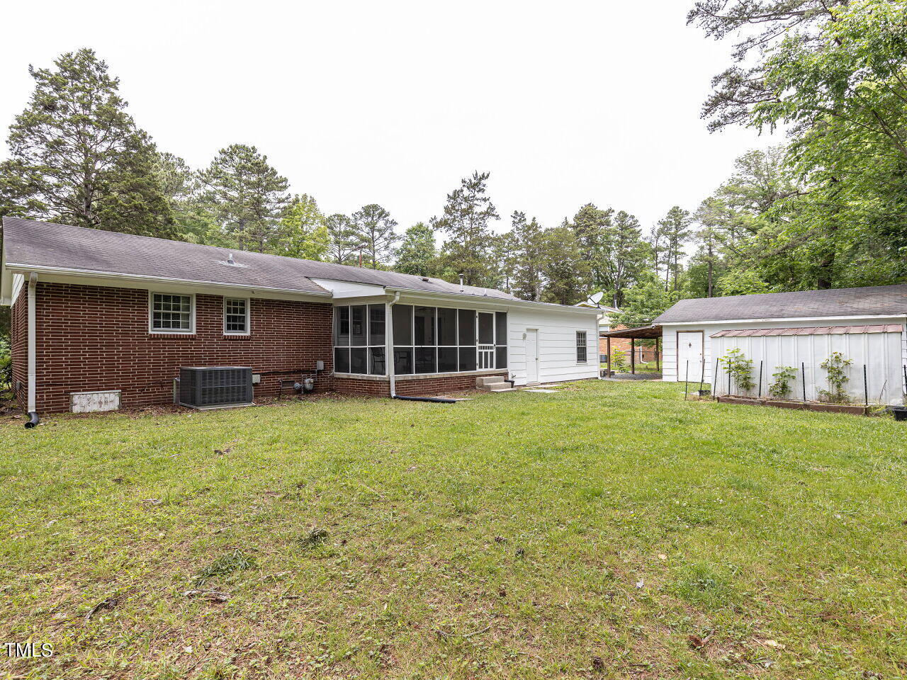 4607 Blanchard Road Durham, NC 27713 - Photo 30 of 31 a house view with a garden space