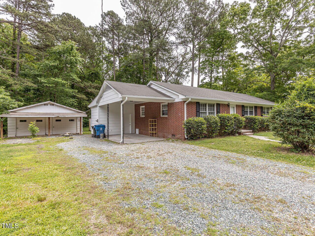 4607 Blanchard Road Durham, NC 27713 - Photo 3 of 31 a front view of a house with yard and green space