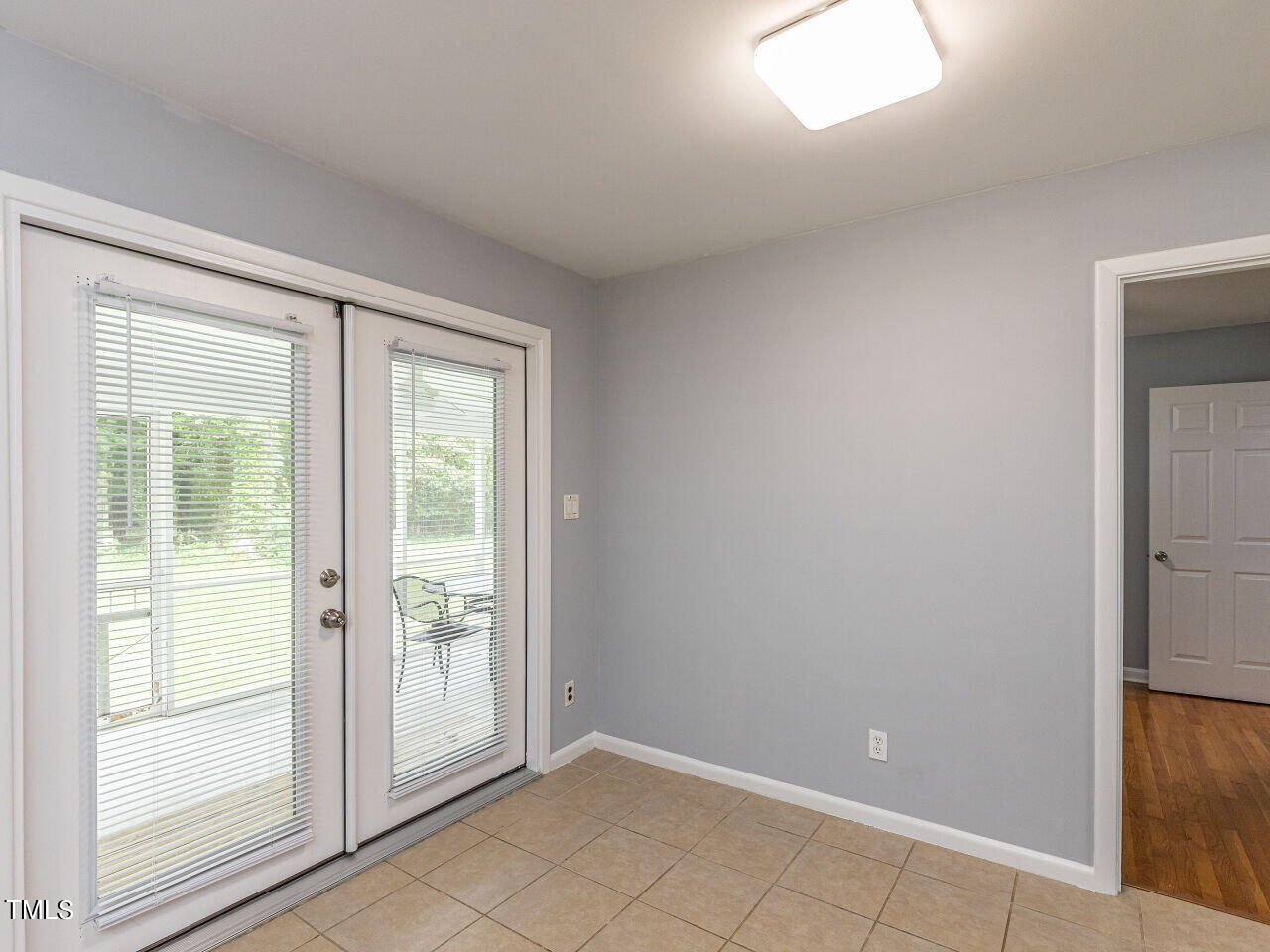 4607 Blanchard Road Durham, NC 27713 - Photo 10 of 31 a view of an empty room with window