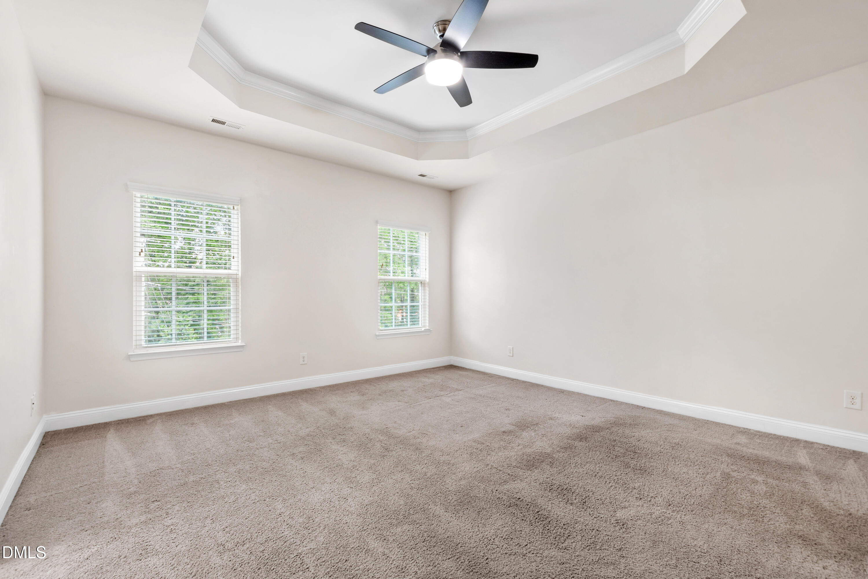 1101 Boxcar Way Apex, NC 27502 - Photo 13 of 27 an empty room with windows and fan