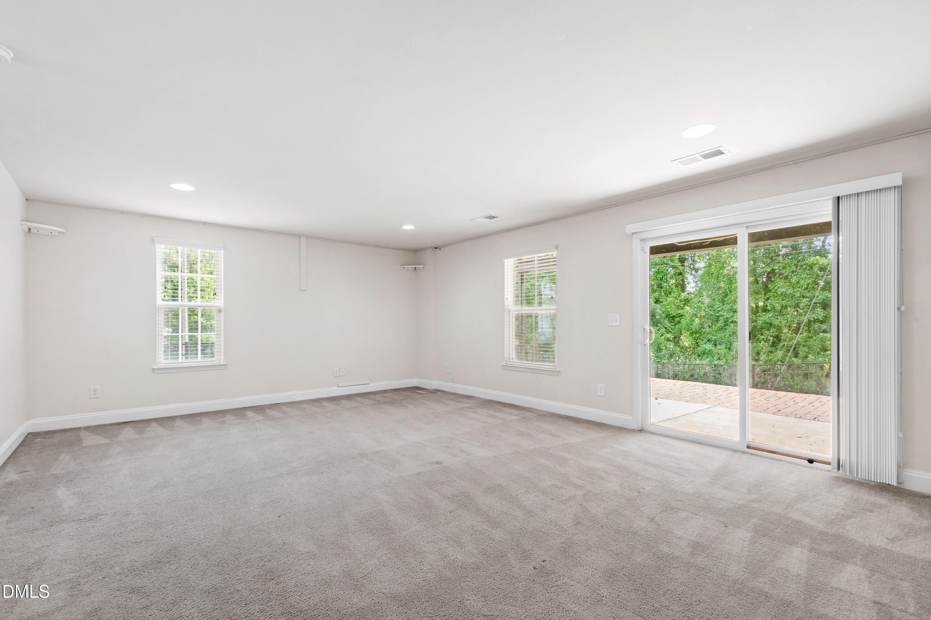 1101 Boxcar Way Apex, NC 27502 - Photo 23 of 27 an empty room with windows