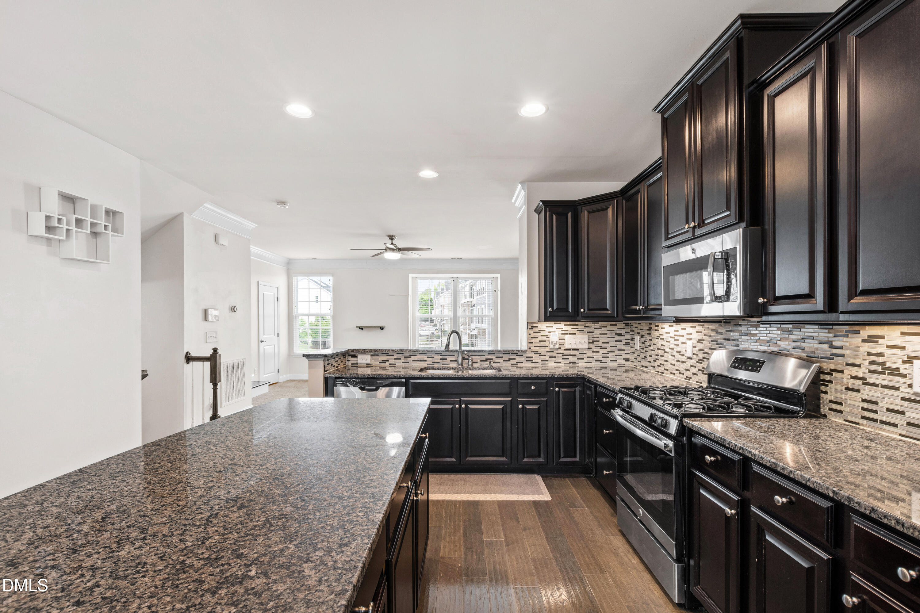 1101 Boxcar Way Apex, NC 27502 - Photo 5 of 27 a large kitchen with granite countertop lots of counter top space