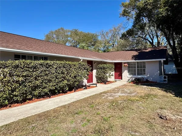 a view of a house with a garage