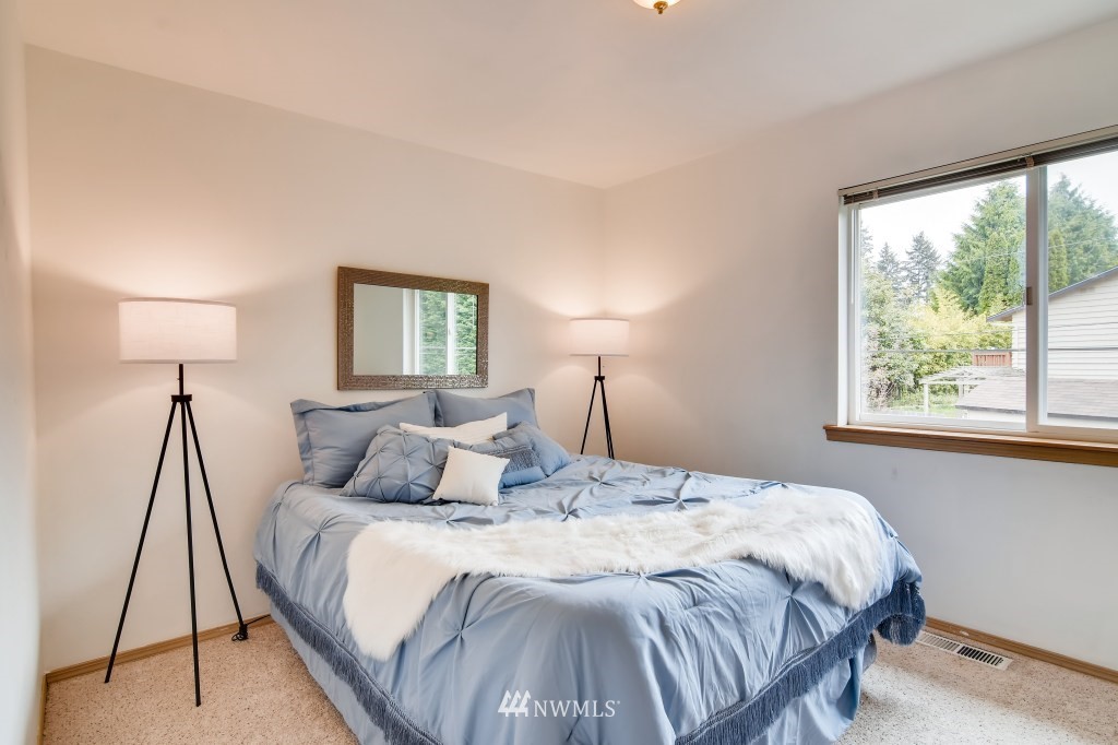 20131 7th Avenue Southeast Bothell, WA 98012 - Photo 22 of 36 a bedroom with a bed and a window