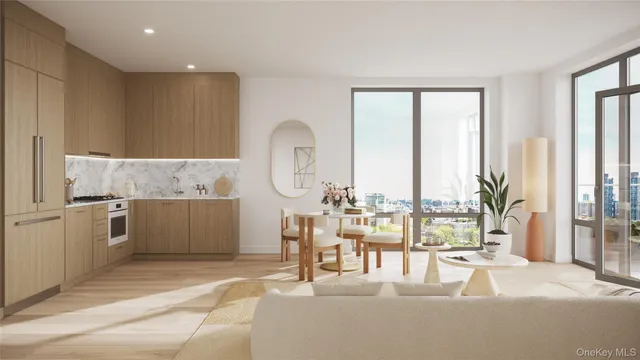 a view of a kitchen with kitchen island and a view of living room