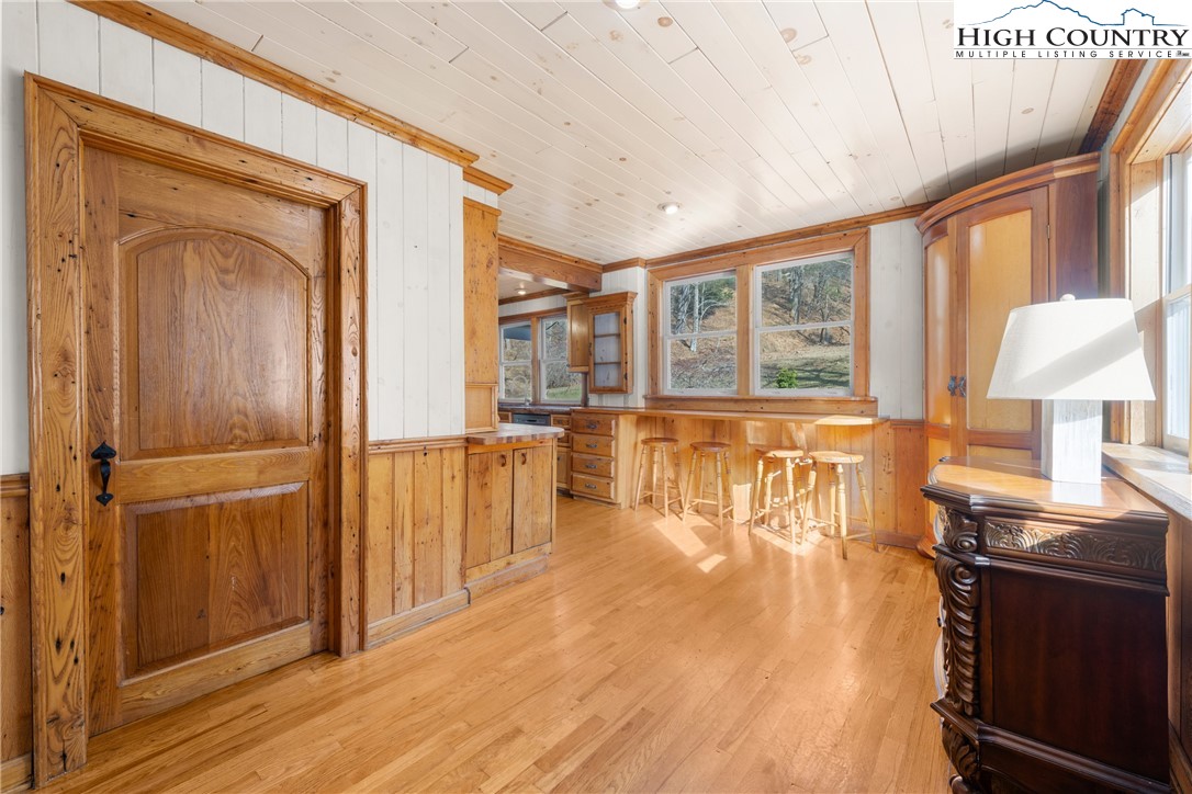 211 Possum Hollow Road Blowing Rock, NC 28605 - Photo 14 of 46 a view of a living room with a fireplace