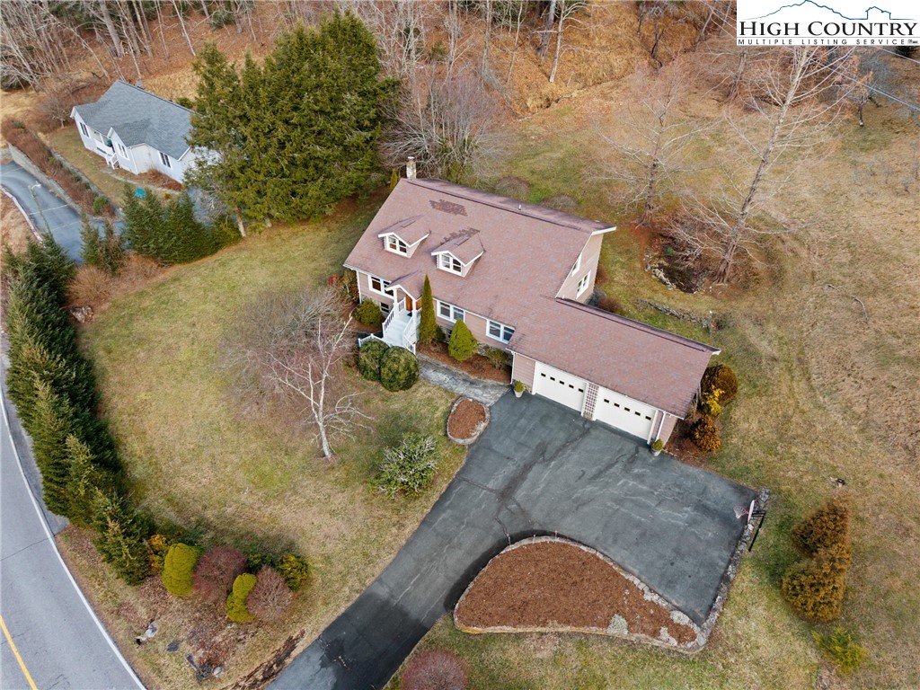 211 Possum Hollow Road Blowing Rock, NC 28605 - Photo 43 of 46 an aerial view of a house with a yard