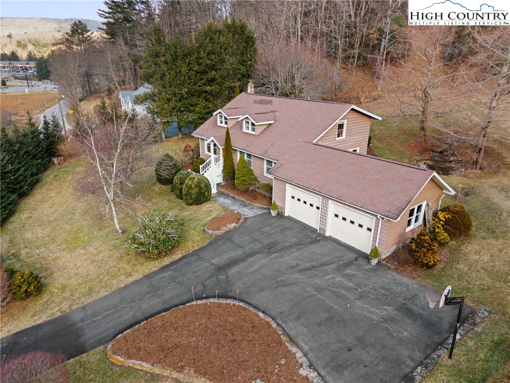 211 Possum Hollow Road Blowing Rock, NC 28605 - Photo 44 of 46 an aerial view of a house with a yard