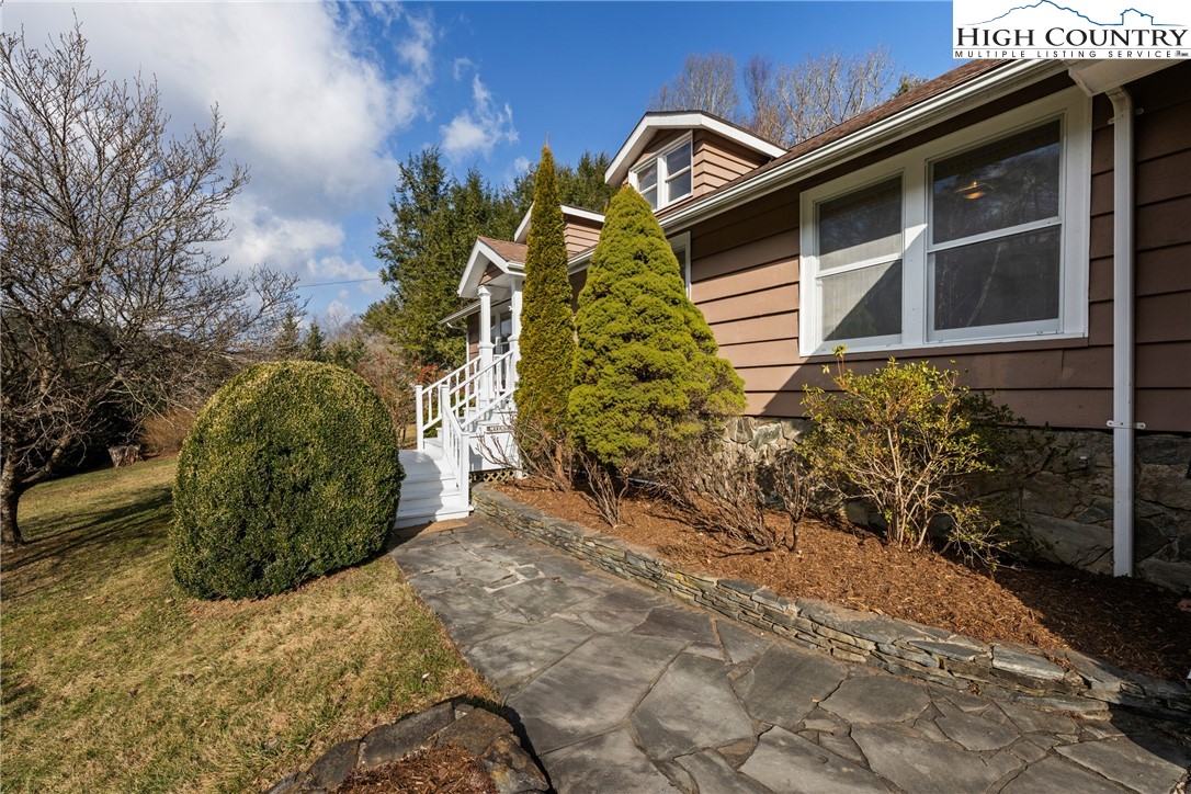 211 Possum Hollow Road Blowing Rock, NC 28605 - Photo 5 of 46 a view of a backyard