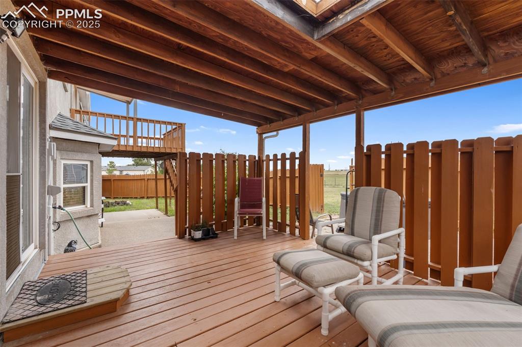 18895 Sage Crest Road Peyton, CO 80831 - Photo 32 of 38 a view of a chairs in wooden floor