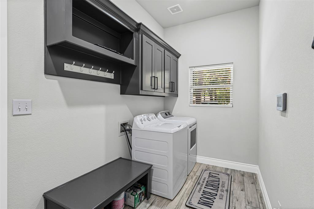 204 West 5th Street Springtown, TX 76082 - Photo 11 of 28 a utility room with dryer and washer