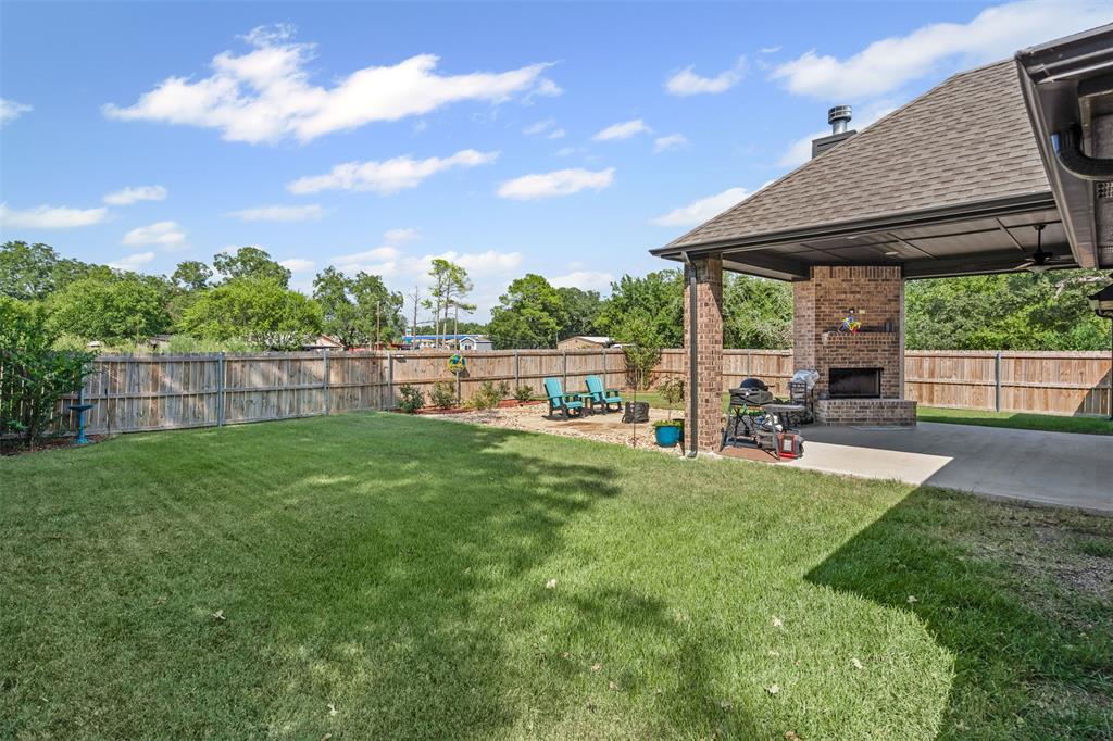 204 West 5th Street Springtown, TX 76082 - Photo 26 of 28 a view of yard with green space
