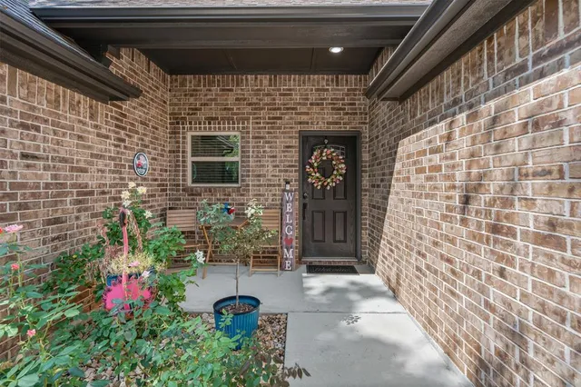 a front view of a house with a garage