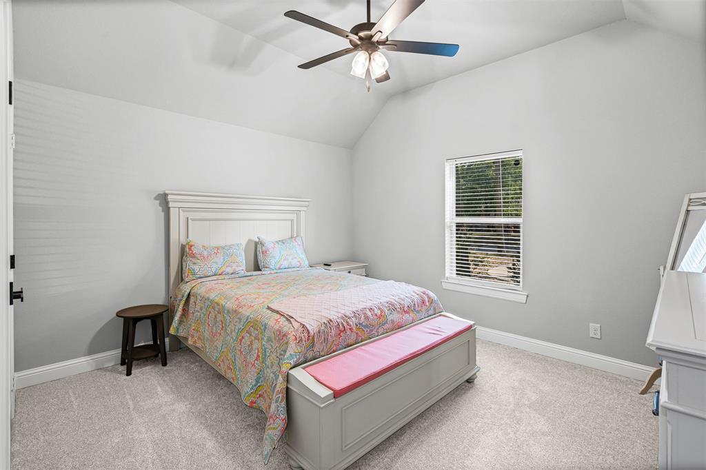 204 West 5th Street Springtown, TX 76082 - Photo 8 of 28 a bedroom with a bed and a window